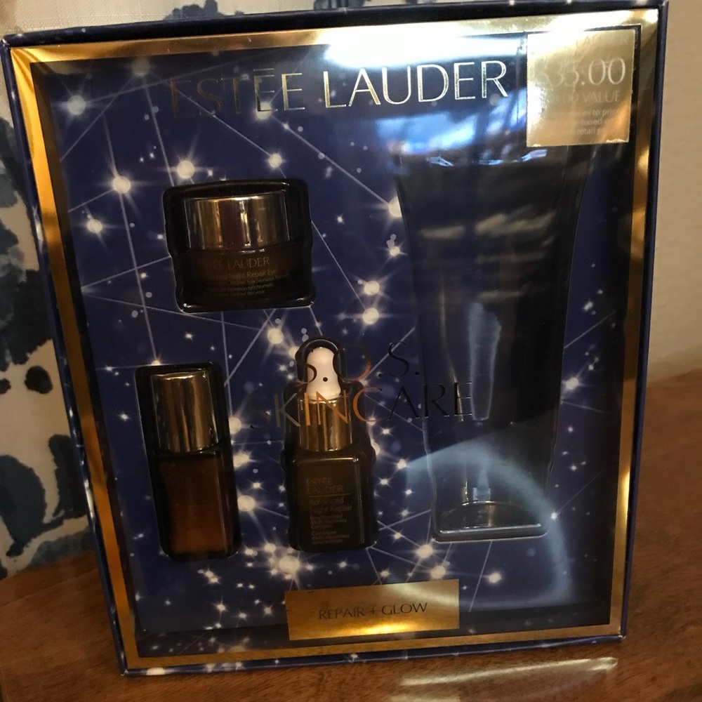 Estée Lauder gift set with item 2, 3, & 4 unopened bottles. NIB